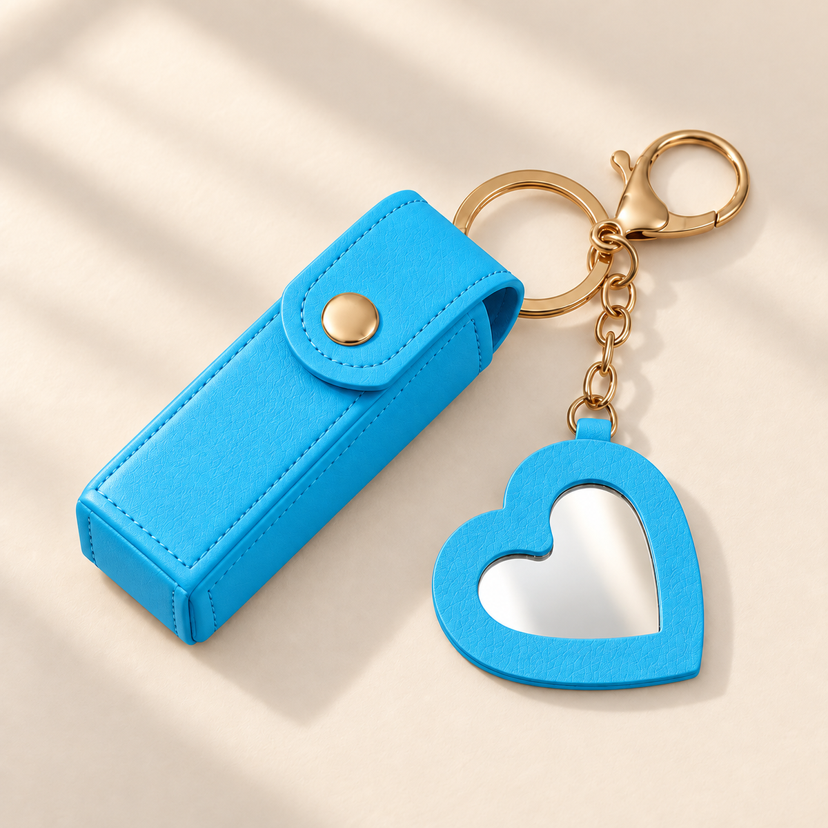 Portalabial llavero con espejo de corazón